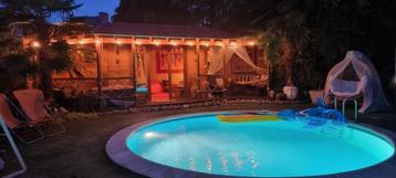 Heated CABANA or pitch your tent in a nice garden with priva beschikbaar voor biedingen