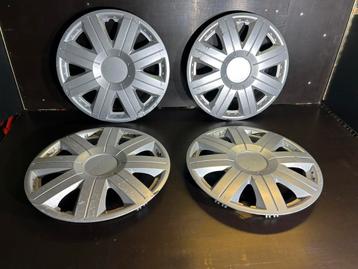 4 universele 14" wieldoppen superprijs 5€/4 beschikbaar voor biedingen