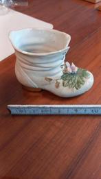 porseleinen laarsje, Ophalen