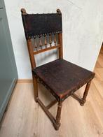 Antieke Spaanse houten stoel met bewerkt leder, Enlèvement