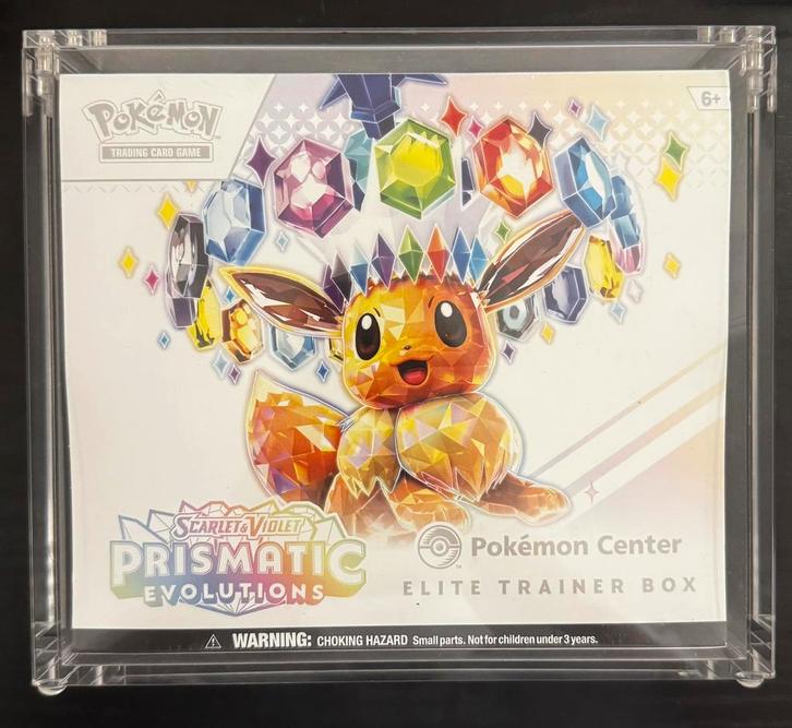 Te ruil: Prismatic Evolutions Pokemon Center ETB, Hobby en Vrije tijd, Verzamelkaartspellen | Pokémon, Zo goed als nieuw, Ophalen of Verzenden