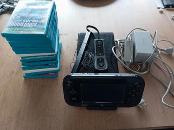 Nintendo WIIU plus 14 games plus 1 controller  beschikbaar voor biedingen