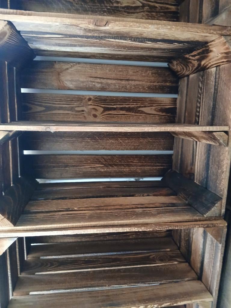 50 tal houten fruitbakken, Enlèvement