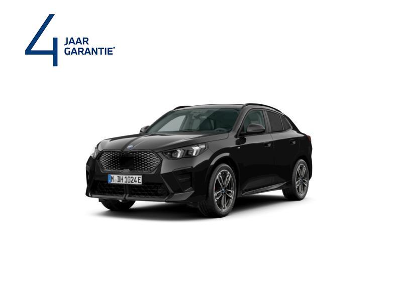 BMW iX2 xDrive30/M-Sport Pro, Auto's, BMW, Automaat, X2, Zwart, 313 pk