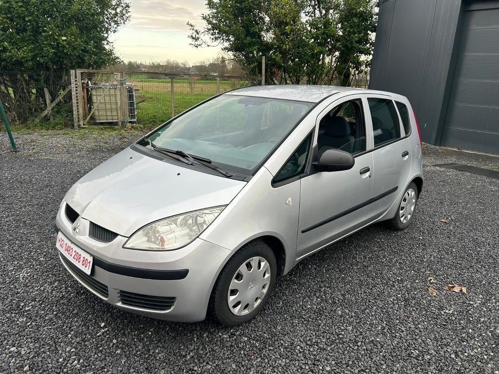 Mitsubishi Colt 1.1 essence AIRCO 107000km CARNET COMPLET, Auto's, Mitsubishi, Colt, Bedrijf, 5 deurs, Euro 4