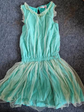 Groen glitterkleedje beschikbaar voor biedingen