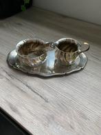 Ensemble en métal argenté, Enlèvement