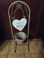 Metalen bloemenstaander met rietenmandje, Ophalen