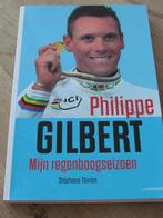 Boek Philippe Gilbert: mijn regenboogseizoen, Livres, Livres de sport, Comme neuf, Course à pied et Cyclisme, Enlèvement, Stéphane Thirion