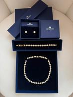 Swarovski Angelic set goud met aankoopbewijs, Handtassen en Accessoires, Ophalen of Verzenden, Zo goed als nieuw, Goud
