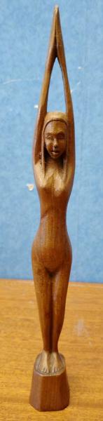 figurine de femme en bois, Enlèvement
