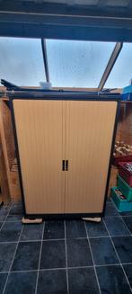 Roldeurkast archiefkast, Ophalen