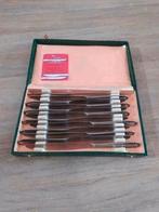 12 messen in etui (Reppel) + onderhoudsfolder, Antiek en Kunst, Antiek | Bestek, Ophalen of Verzenden