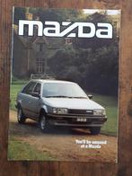 MAZDA - Vous serez surpris par une Mazda des années 80, Livres, Autos | Brochures & Magazines, Mazda, Enlèvement ou Envoi, Neuf