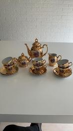 Goudkleurig mokka servies, Ophalen