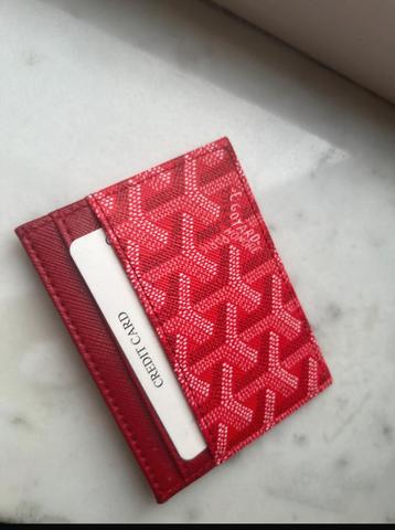 Rode ledere portomonee van goyard beschikbaar voor biedingen