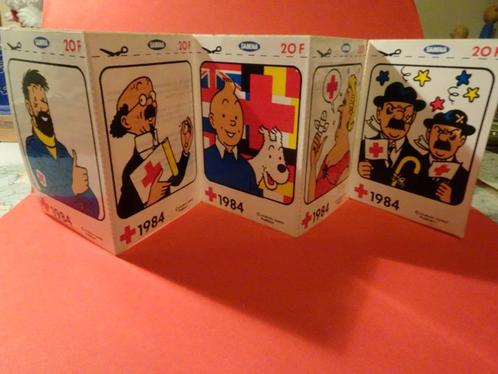 Vel met 5 stickers van Kuifje - Rode Kruis 1984, Verzamelen, Stickers, Zo goed als nieuw, Strip of Tekenfilm, Ophalen of Verzenden