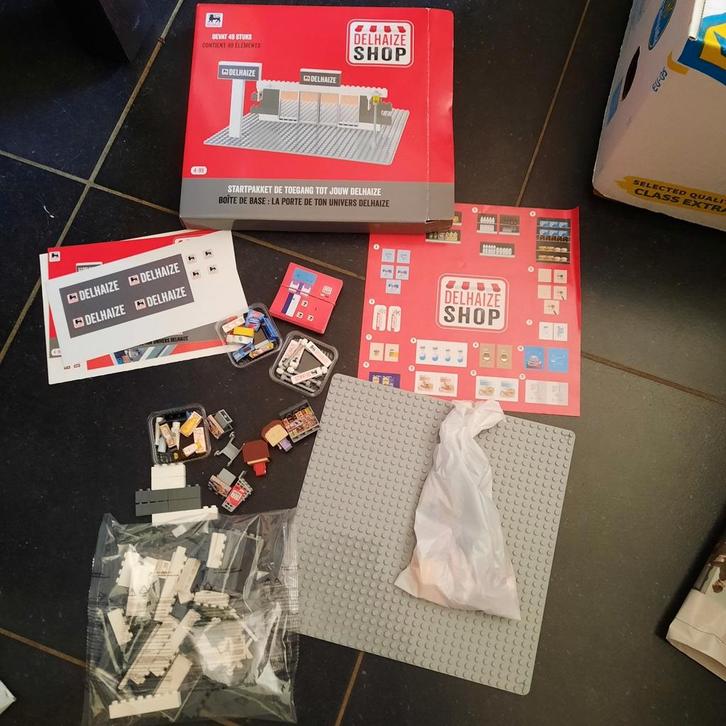 Lego blokjes ( lijkt er op ) om Delhaize te maken ., Hobby en Vrije tijd, Overige Hobby en Vrije tijd, Nieuw, Ophalen of Verzenden