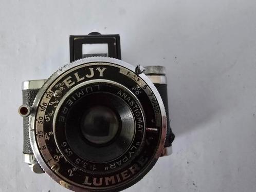 Subminiatuur Camera Lumiere Eljy met tasje en filmrolletje, Audio, Tv en Foto, Fotocamera's Analoog, Gebruikt, Overige Merken