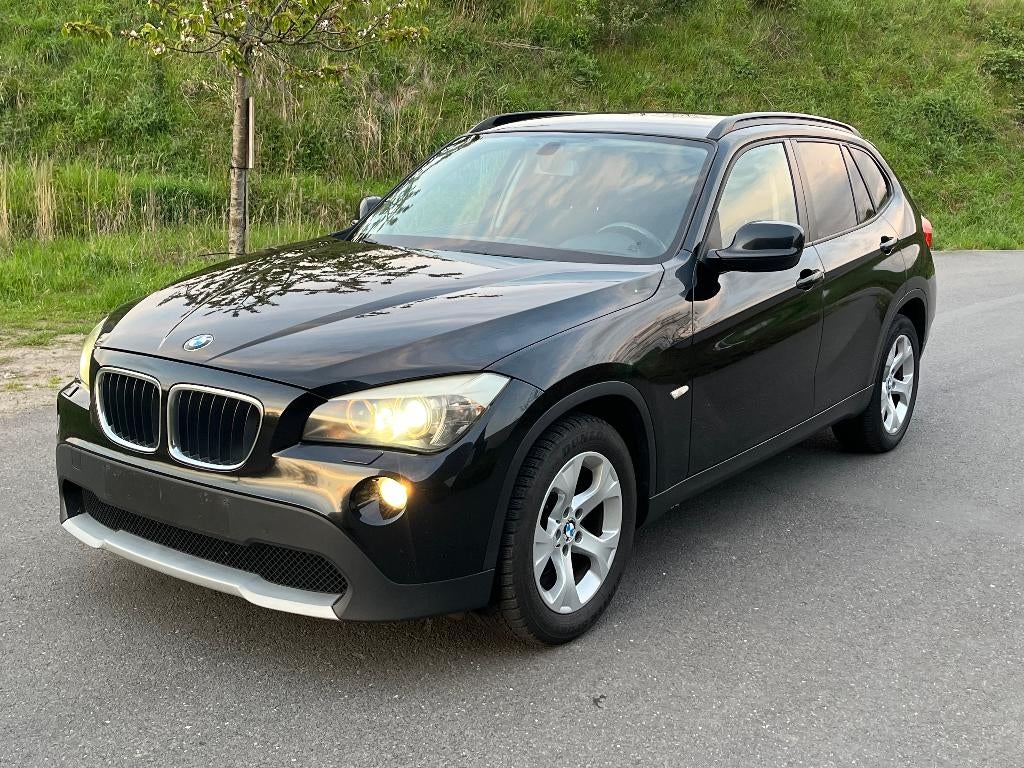 BMW X1 18D  Automaat / Xenon / Navi, Euro 5, 1995 cc, Zwart, 105 kW
