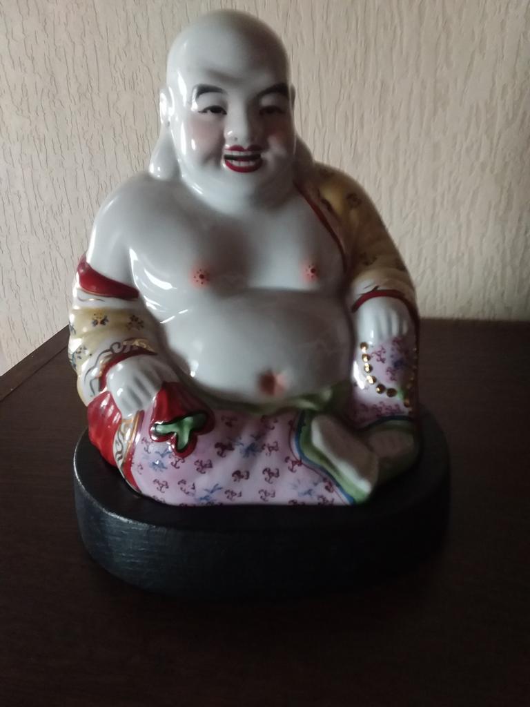 Buddha beeld op voetstuk, Ophalen