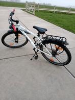 Kinderfiets voor 8 tot 12 jarigen, Ophalen