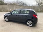 Opel Corsa 1.2 benzine 2013 met 118000km*Parkeersensor*airco, Euro 5, 4 cilinders, Leder en Stof, Zwart