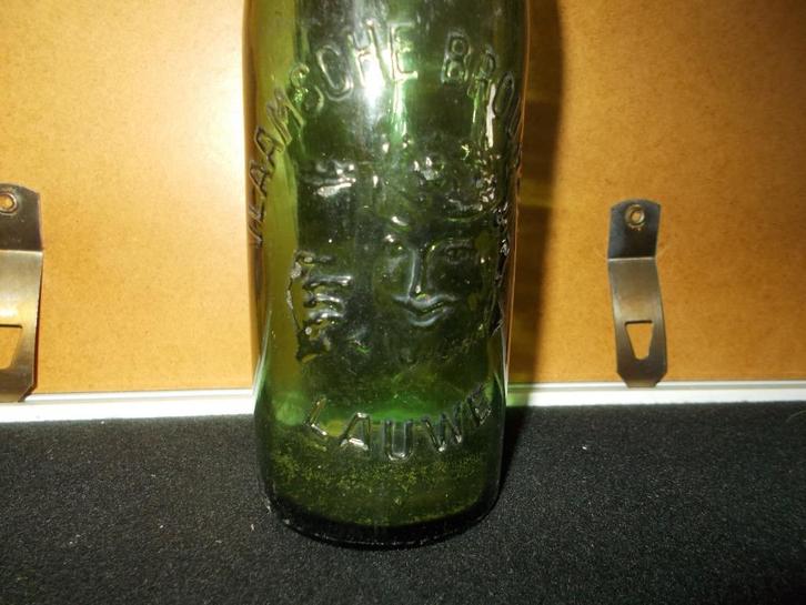 LAUWE - fles in relief - De Vlaamsche brouwerij 1/3L - groen, Verzamelen, Biermerken, Gebruikt, Flesje(s), Overige merken, Ophalen of Verzenden