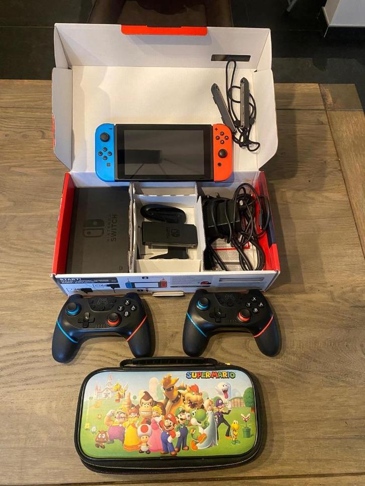 Nintendo Switch Incl. 2 controllers & 6 Spellen, Games en Spelcomputers, Spelcomputers | Nintendo Switch, Zo goed als nieuw, Switch 2019 Upgrade
