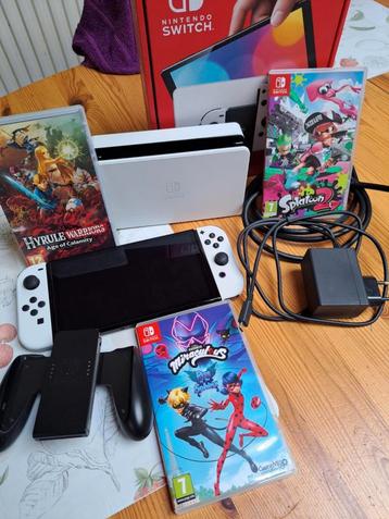 Te koop Nintendo Switch Oled White, compleet met 3 spellen  beschikbaar voor biedingen