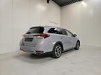 Toyota Auris Touring Sport 1.8 Hybrid Autom. - Airco - Tops, Autos, Toyota, 99 ch, 5 places, 4 portes, Hybride Électrique/Essence