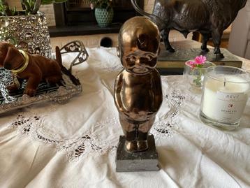 Brons kleurig Kewpie popje beschikbaar voor biedingen
