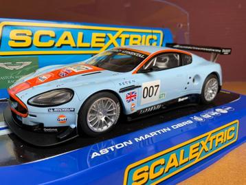 Aston Martin DB9 - Gulf Racing Slot car MIB, Overige merken, Auto, 1:32 tot 1:50, Nieuw