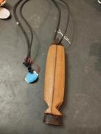 Een hang fluit in hout kleur licht bruin, Enlèvement