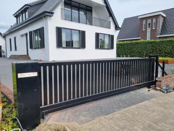 Lamellen schuifpoort of draaipoort ook automatisch  beschikbaar voor biedingen