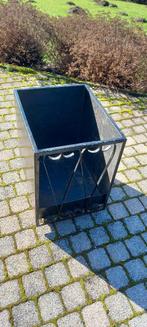 bac à buches à roulettes, Enlèvement