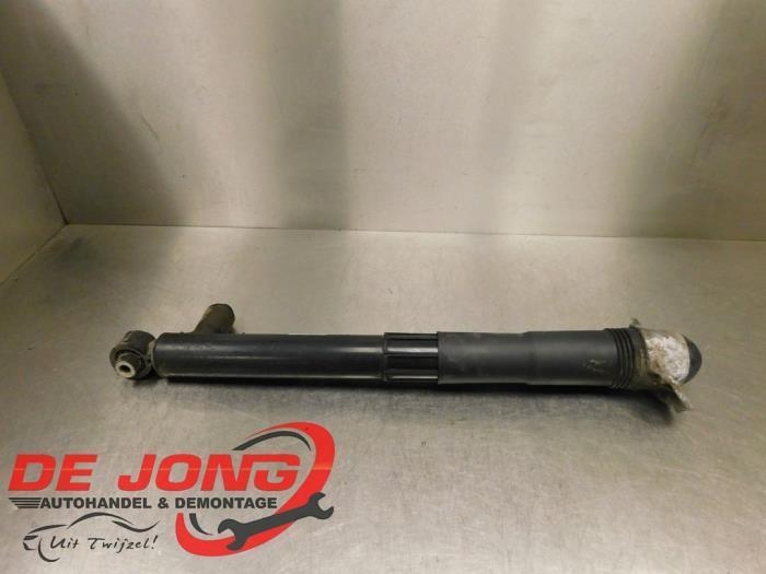 Schokdemper links-achter van een Volkswagen Golf, Auto-onderdelen, Ophanging en Onderstel, Volkswagen, Gebruikt, 3 maanden garantie