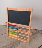 Houten telraam met schoolbord, Enlèvement, Utilisé