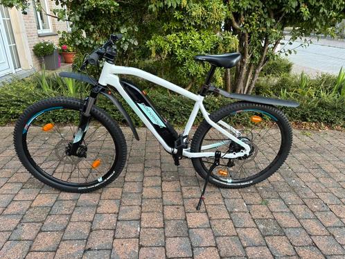 Rockrider E ST100, Fietsen en Brommers, Elektrische fietsen, Zo goed als nieuw, Overige merken, 50 km per accu of meer, Ophalen