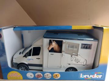 24,99 eur Bruder paardentrailer nieuwstaat + originele doos disponible aux enchères