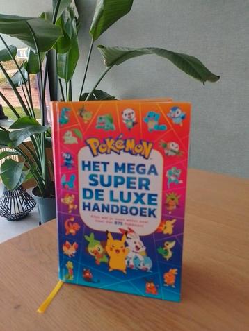 Pokémon Het mega super de luxe handboek beschikbaar voor biedingen