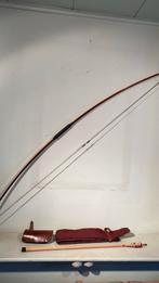 Antieke houten longbow, Ophalen