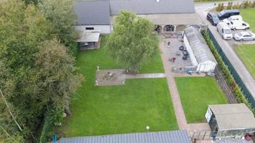 Huis met vijver en bos te koop