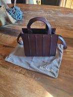 MaxMara tas, Ophalen