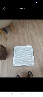 Puppy trainer - plasmat houder, Ophalen