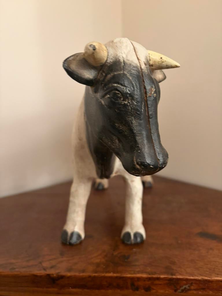 Gietijzeren spaarvarken koe, Ophalen