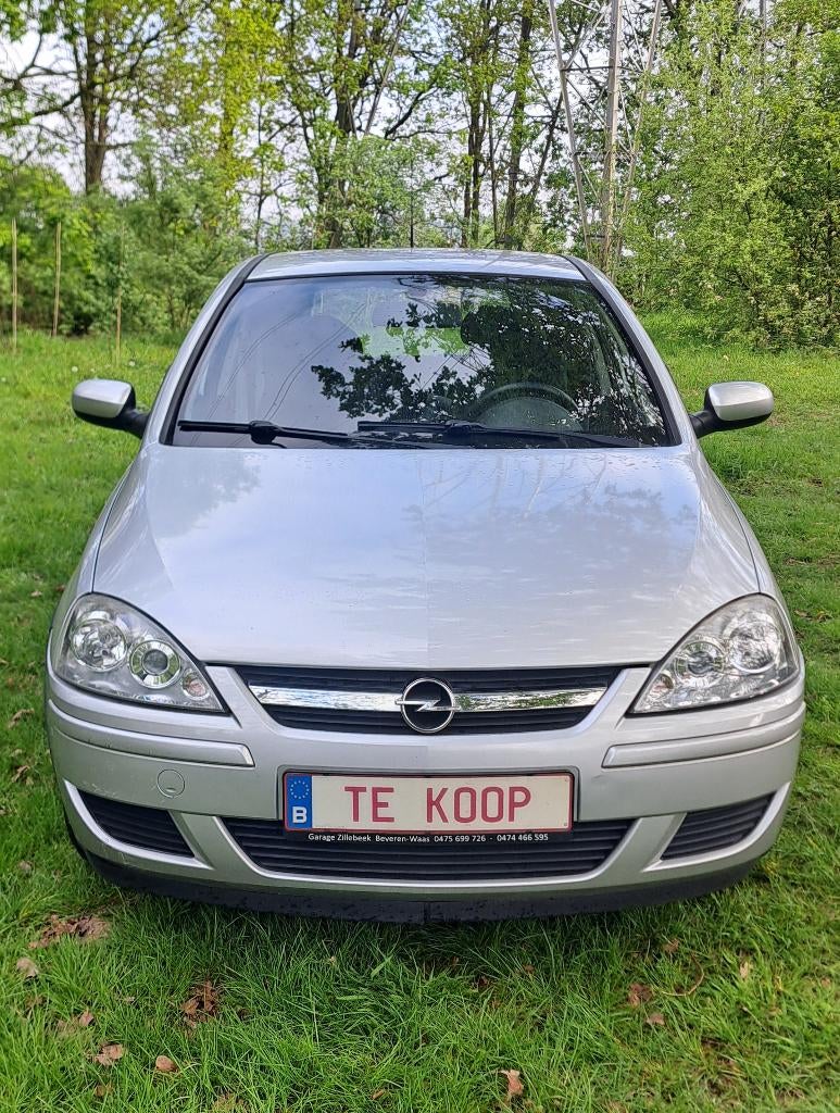 Opel Corsa: 102.000km + airco +jaar garantie +groot nazicht!, Auto's, Voorwielaandrijving, Stof, 129 g/km, 4 cilinders