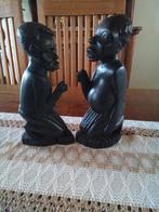 Beelden in ebbenhout hoogte 23 cm, Enlèvement