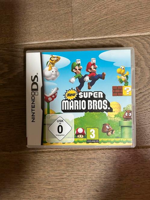 New Super Mario Bros. Nintendo DSI game, Consoles de jeu & Jeux vidéo, Jeux | Nintendo DS, Utilisé, Autres genres, À partir de 3 ans