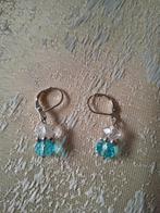 Oorbellen met blauwe en doorschijnende parel, Ophalen of Verzenden